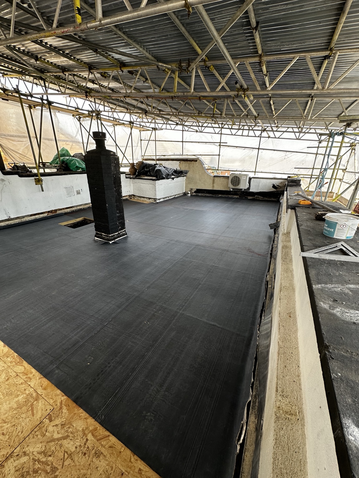 Flooring installation underway in a commercial building