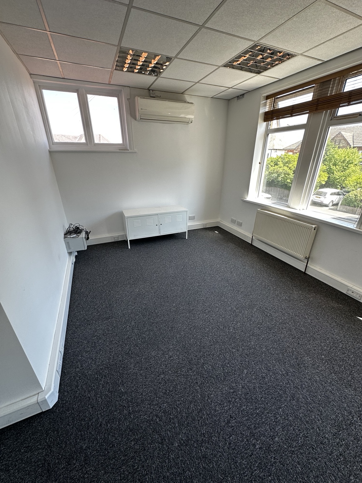 Completed refurbished room with new flooring and finishes